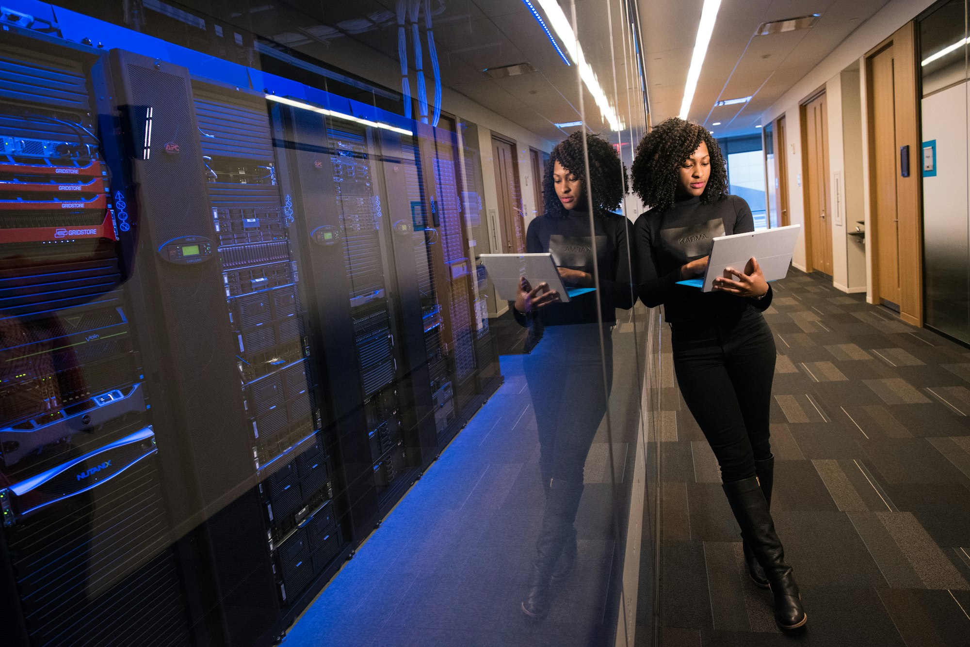 Operations engineer overseeing reliable technology systems